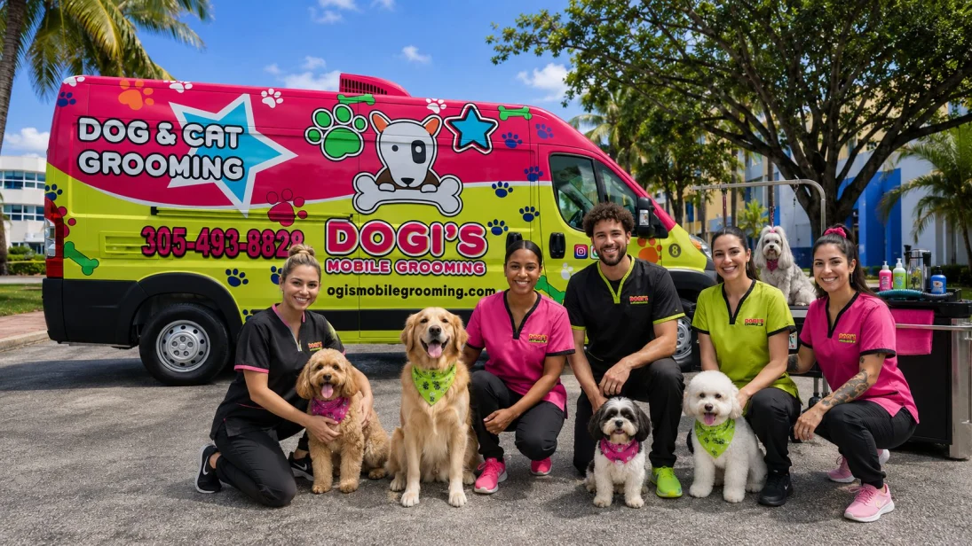 Dogi's grooming team kneeling with dogs and a cat in front of the mobile grooming van